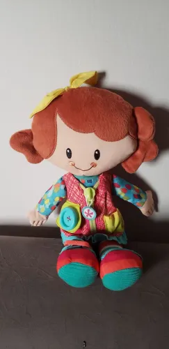 Boneca aprendendo a se vestir fisher Price
