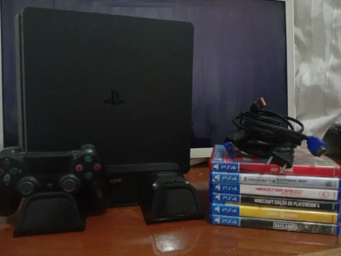 Ps4 slim 1tera +(base de resfriamento +6 jogos + controle )