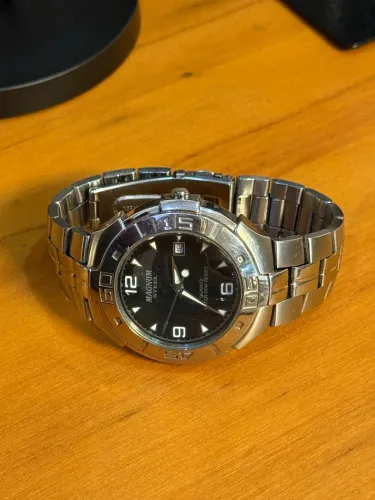 Relógio Masculino Magnum Steel Analógico - Quartz 100M (Aço Inox / Mostrador Preto)