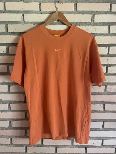 Camiseta Nike x Nocta Big Body CS laranja