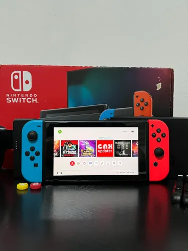 Nintendo Switch V2 Lotado de Jogos D3BL0QU3AD0