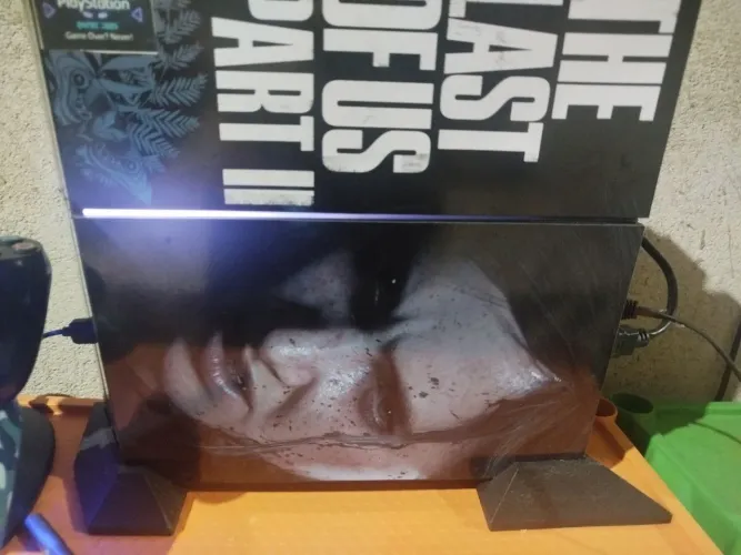 Ps4 fat 1Tb, com acessórios e dois controles, customizado com the last of us part II