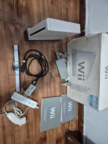 Nintendo Wii na caixa e manual