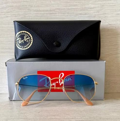 ÓCULOS RAY-BAN HEXAGONAL, NOVO. LENTE AZUL DEGRADÊ, ARMAÇÃO DOURADA
