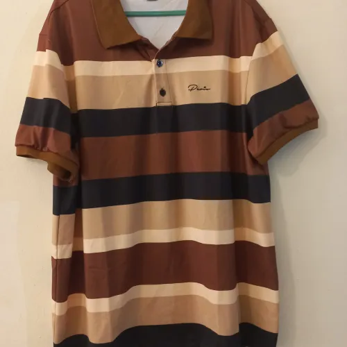 Nova! Camisa gola polo,importada tam.G. 95% poliéster e 5% elastano