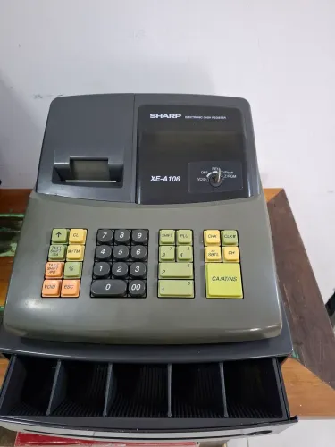 Caixa registradora sharp xe-A106