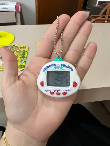 Bichinho Virtual TAMAGOSHI DINKIE DINO original 