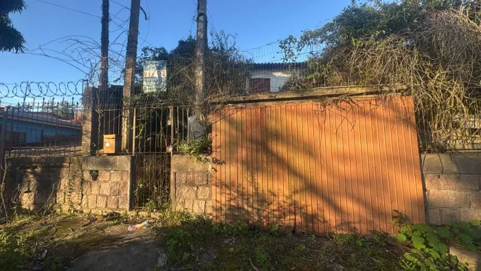 Terreno com casa