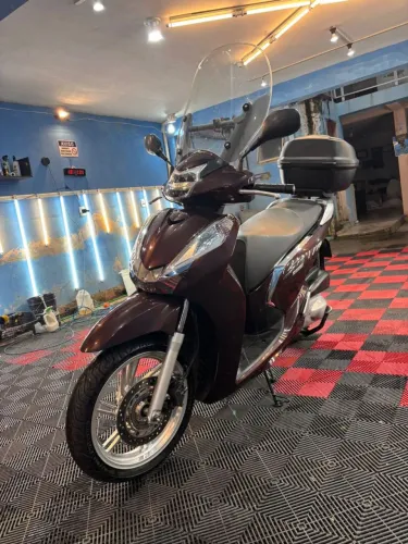SH300I com Baú Givi