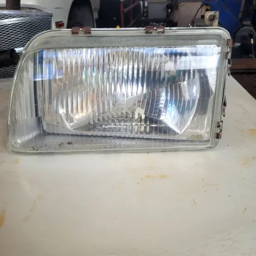 Farol lado direito Ford sapáo 93 a98