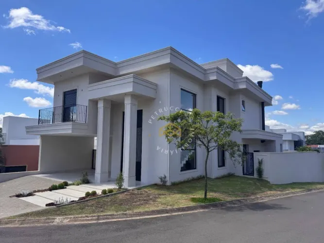 Casa com 3 dormitórios à venda, 412 m² por R$ 3.900.000,00 - Condomínio Reserva do Itamara