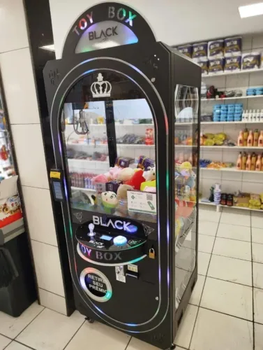 Vendo máquina de pelúcia (grua)