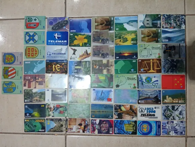 Lote com 59 cartões telefônicos