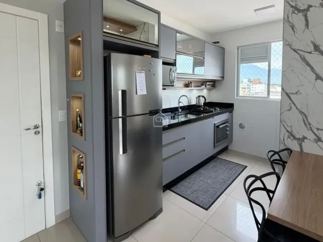 Apartamento de 2 dormitórios à venda no Bairro- Aririú em Palhoça.