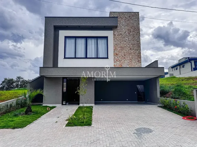 CASA MOBILIADA ALTO PADRÃO CONDOMÍNIO SANTA ANNA COM 3 SUÍTES E 4 VAGAS EM SANTANA DE PARN