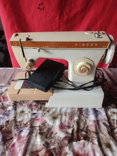 Vendo máquina de costura singer