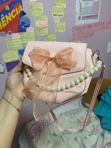 Vendo bolsa rosa com pérolas