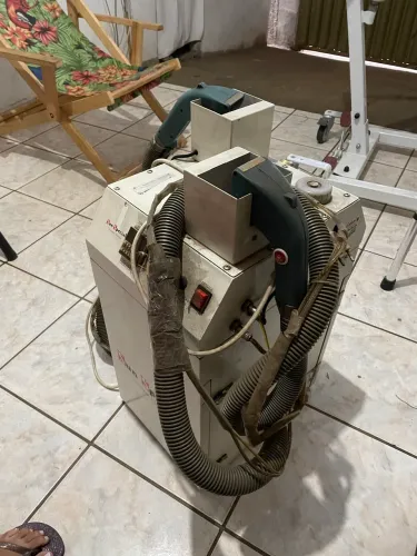 Máquina de tirar linha