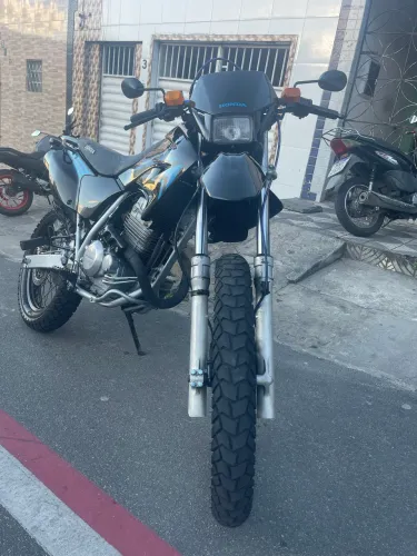 Vendo ou troco Honda Xr 250cc tornado 2 pneus zero sem nada pra fazer cuida ?