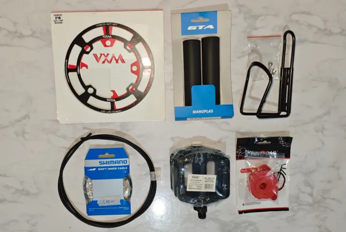 Acessórios Bike (Manopla, Pedal, Suporte Garrafa, Protetor Coroa, etc..