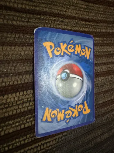 Figurinha Reshiram & Charizard-GX (TAG TEAM)