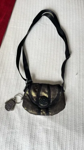 Bolsa Kipling pequena Dourada Metalizada