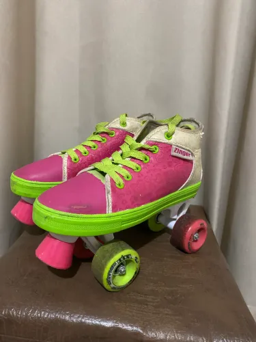 Patins Zinger tamanho 35 com marcas de uso
