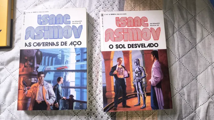Livros Isaac asimov: "Sol desvelado" e "As cavernas de aço"