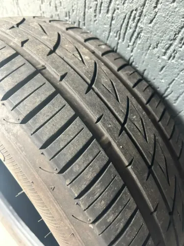 Pneu Firestone F600 195/55 R15 85H usado com avaria