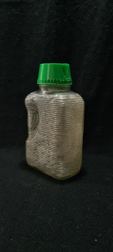 Garrafa vintage de vidro texturizado com tampa 