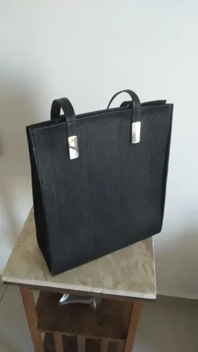 Bolsa masculina em couro sintético