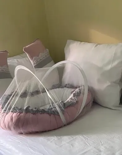 Ninho e almofada amamentação 