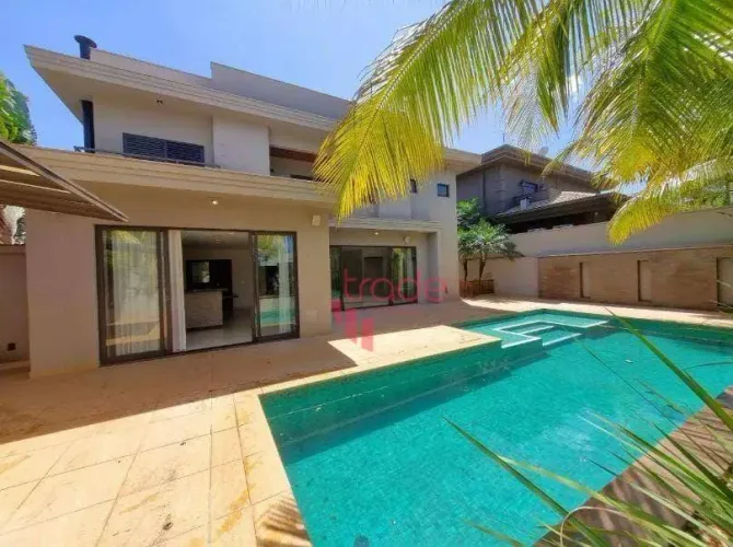 Casa para Comprar ou Alugar de 06 Dormitórios, sendo 04 Suítes no Bairro Jardim Botânico e