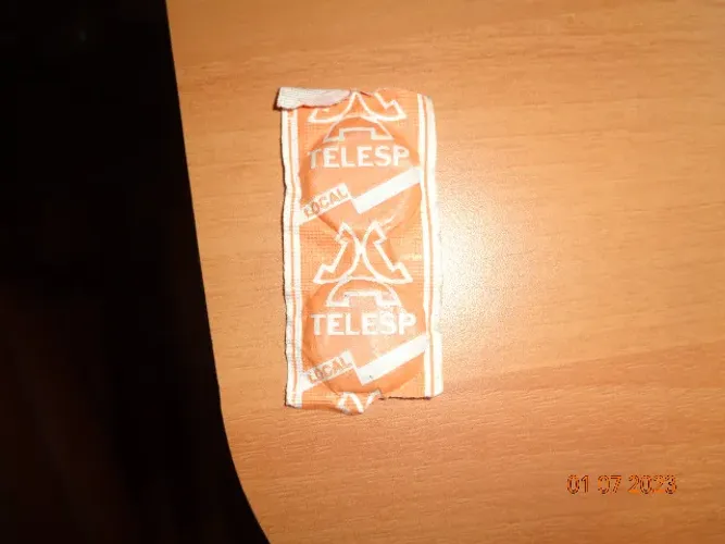 Par de fichas de telefone de rua lacradas no envelope original 