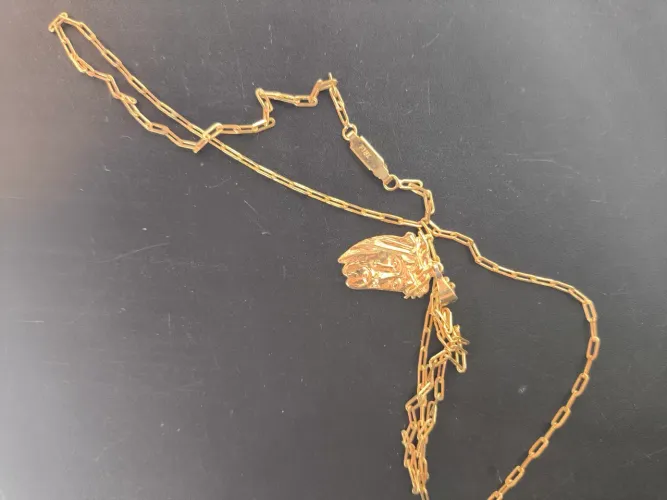 CORDÃO E PINGENTE FOLEADO A OURO 200,00$