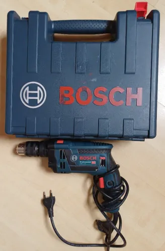 Furadeira de impacto reversível Bosch GSB 16 RE 127v 750w + maleta usada!