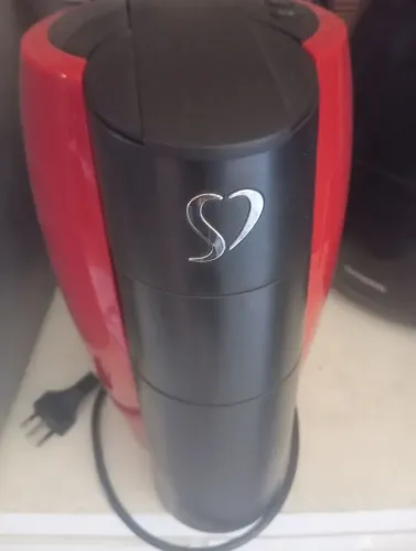 Máquina de café três corações
