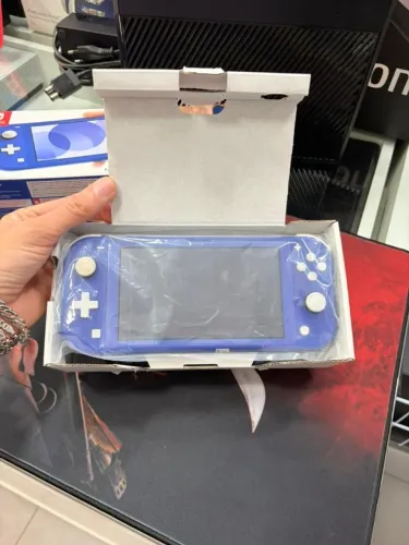 Nintendo Switch lite bloqueado na caixa zero -- faço olx