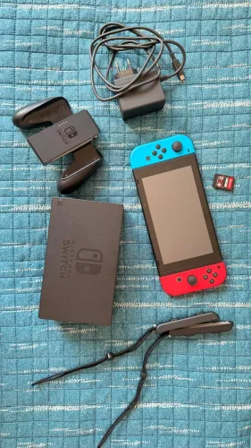 Nintendo Switch com todos os acessórios + NBA2k26 + Jogos
