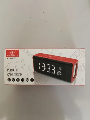 Caixa de som c/rádio relógio