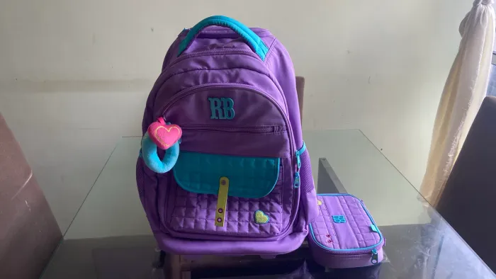 Vendo mochila de carrinho com estojo Rebeca bonbon