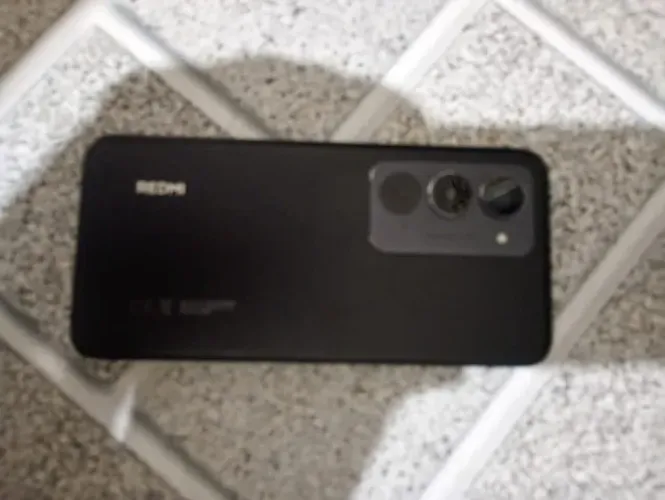 Célula redimi note 15