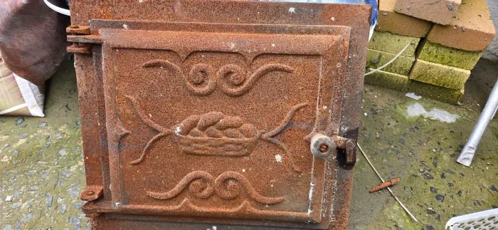 Tampa de forno de ferro fundido