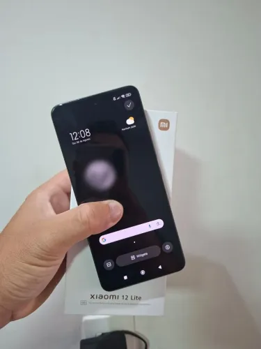 Vendo ou troco MI 12 lite impecável zerado completo