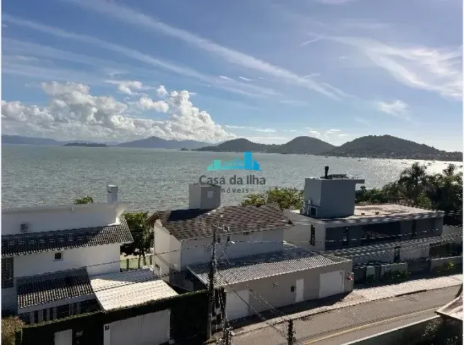 Casa com 4 suítes no Cacupé - financia