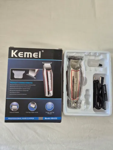 Máquina de cortar cabelo kemei nova