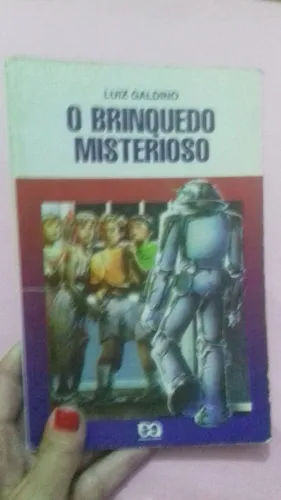 Livro brinquedo misterioso