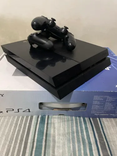 Ps4 fat com pasta térmica trocada e limpeza interna na caixa!