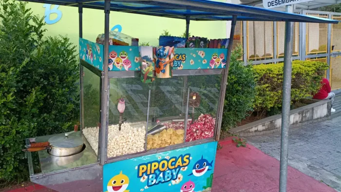 Preciso de ajudante para vender pipoca ponto fixo