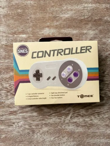 CONTROLE SUPER NINTENDO MARCA TOMEE (NOVO E LACRADO)